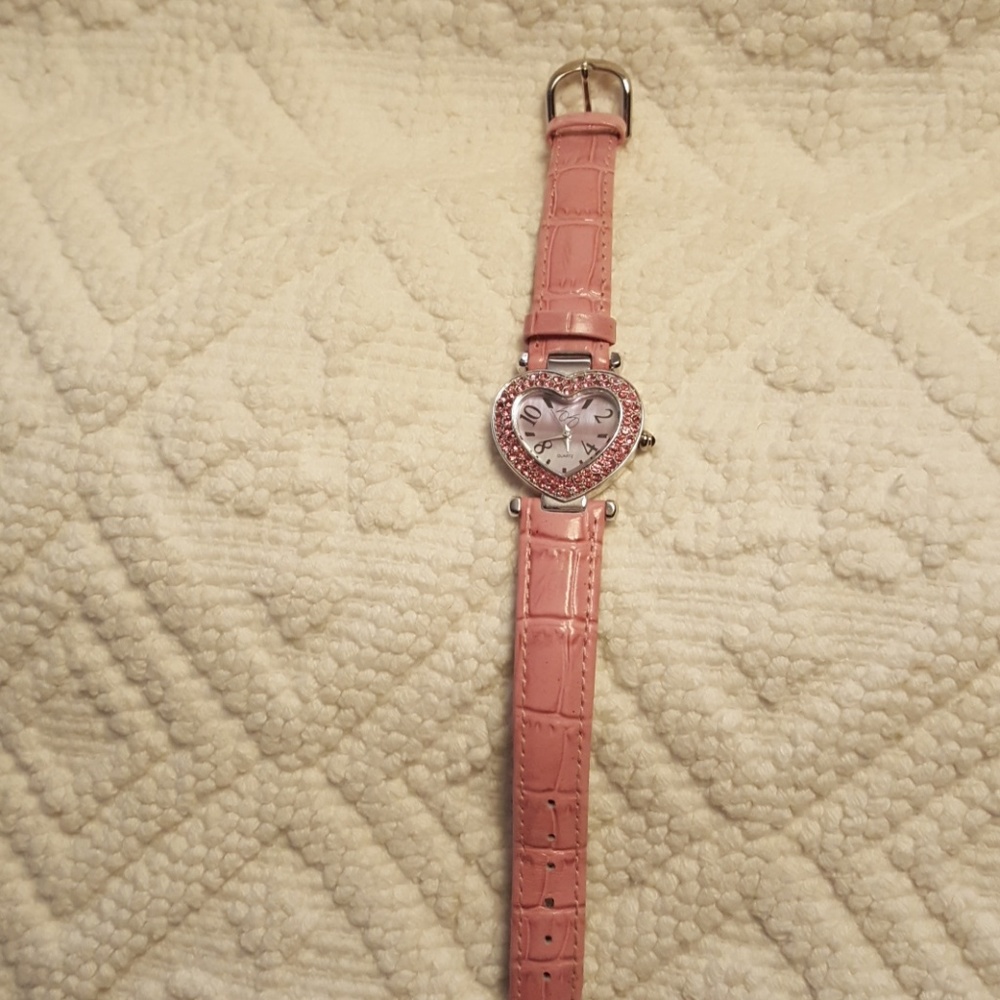 Pink watch.